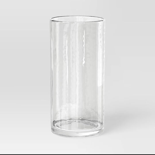 A clear glass cylinder vase